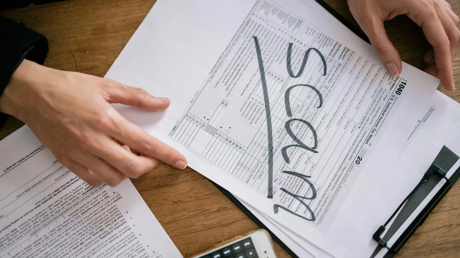 Three Charged with Fraud in Smart Prime Group Investigation