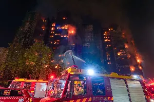 Fire Tragedy in Hong Kong: Thirteen Confirmed Dead in High-Rise Blaze