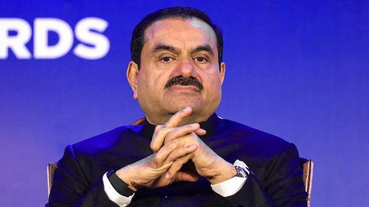 Gautam Adani's Meeting with Karnataka CM Raises Political Concerns